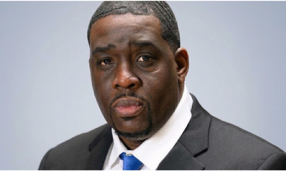 Broderick Bevineau, IT manager and cybersecurity professional, in a black suit and blue tie